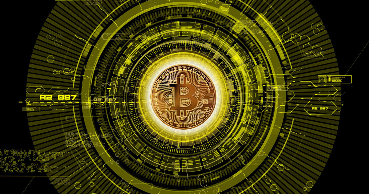 A bronze Bitcoin coin centered within complex glowing yellow cyber circuitry representing AML crypto UAE regulatory systems